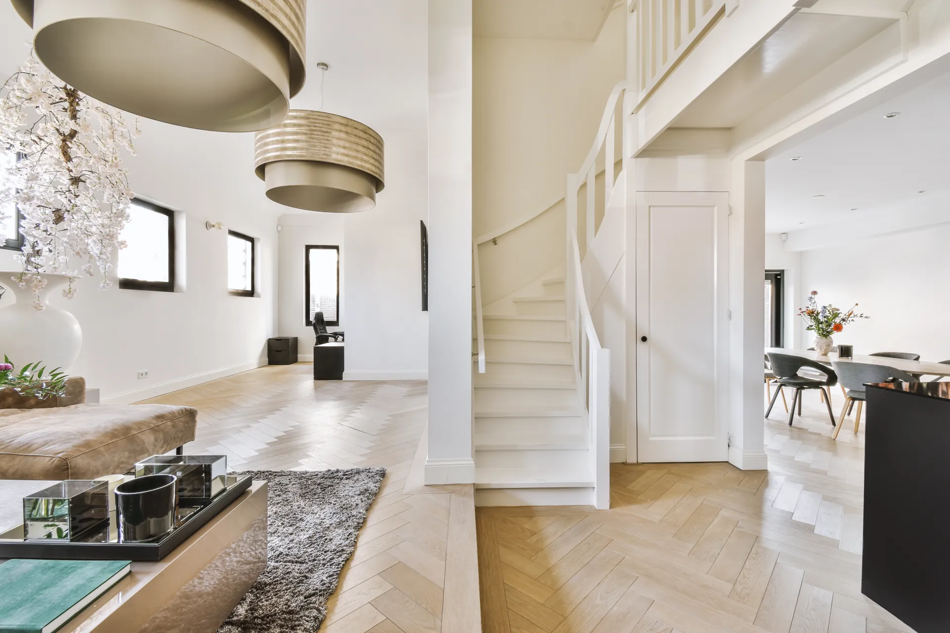 Spacious, bright home interior with warm wood floors and natural light